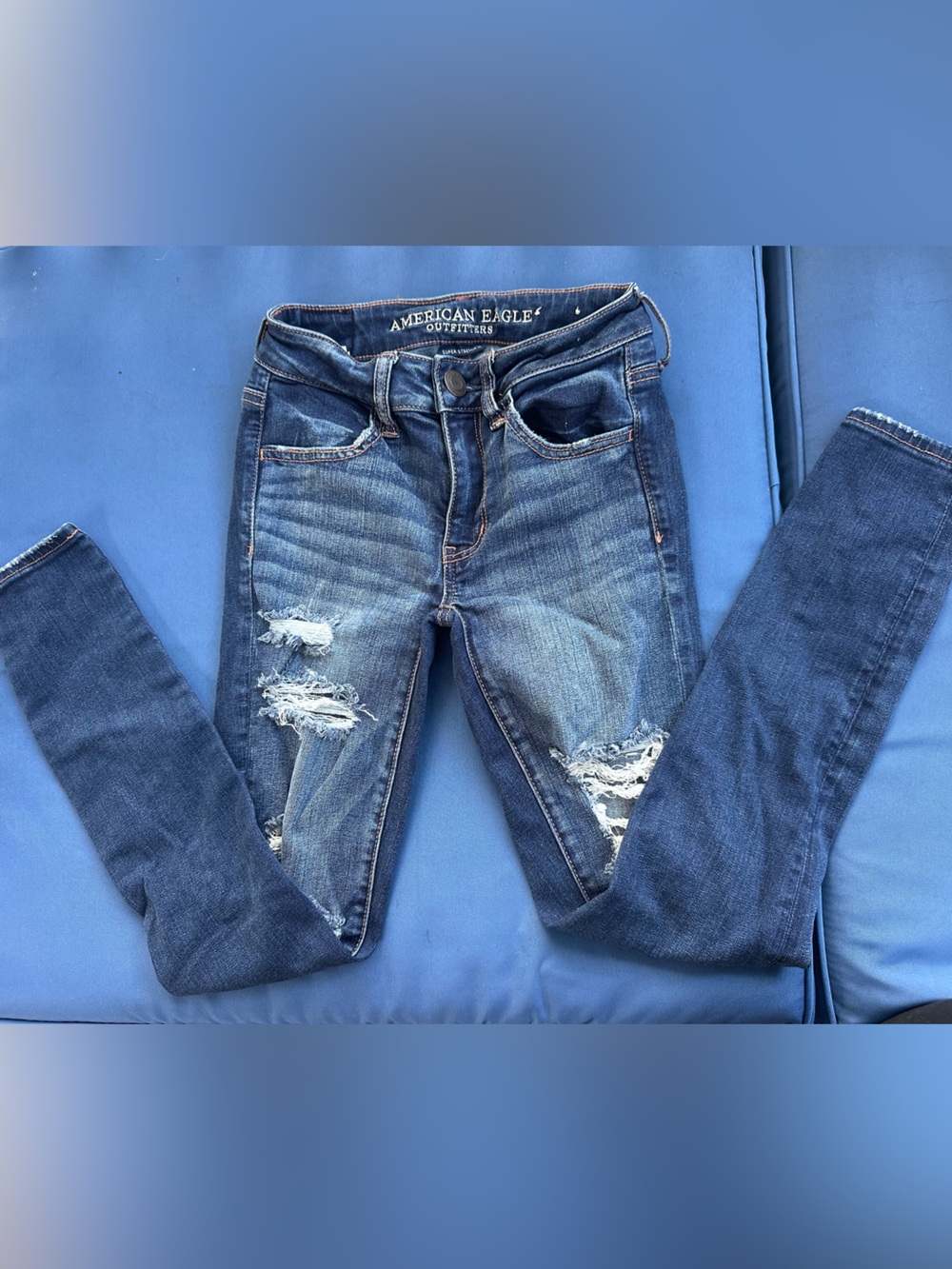 American Eagle Outfitters  Ripped Mid-Blue Skinny Jeans Size 00